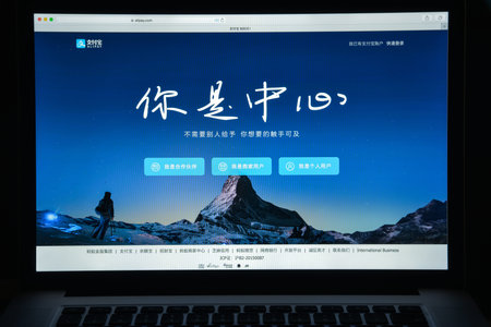 Milan, Italy - August 10, 2017: Alipay website homepage. It is a third-party mobile and online payment platform. Alipay.com logo visible.のeditorial素材