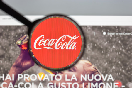 Milan, Italy - August 10, 2017: Coca cola website homepage. It is is a carbonated soft drink produced by The Coca-Cola Company. Cola logo visible.のeditorial素材