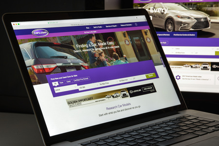 Milan, Italy - August 10, 2017: Cars.com website homepage. It is a website which was launched in June 1998. It is the second largest automotive classified site. Cars.com logo visible.のeditorial素材