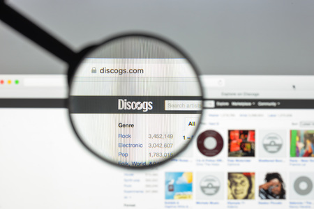 Milan, Italy - August 10, 2017: Discogs website homepage. It is short for discographies, is a website and crowdsourced database of information about audio recordings. Discogs logo visible.のeditorial素材