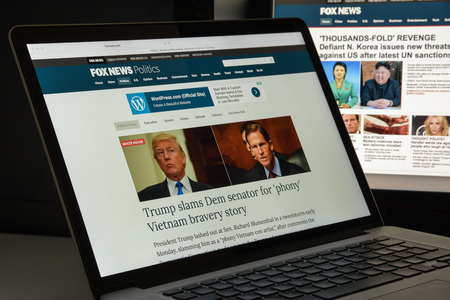 Milan, Italy - August 10, 2017: Foxnews website homepage. It is an American basic cable and satellite television news channel owned by the Fox Entertainment Group. Foxnews logo visible.のeditorial素材