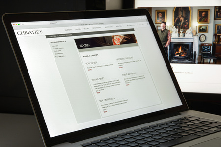 Milan, Italy - August 10, 2017: Christies.com website homepage. It is a British auction house. Christies logo visible.のeditorial素材