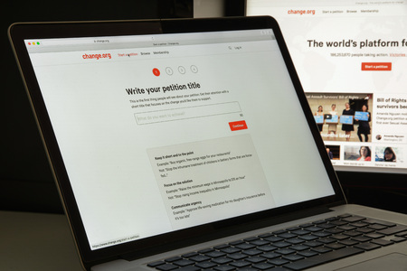 Milan, Italy - August 10, 2017: Change.org website homepage. It is a petition website operated by for-profit Change.org. Change logo visible.のeditorial素材