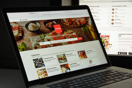 Milan, Italy - August 10, 2017: Zomato website homepage. It is a restaurant search and discovery service founded in 2008. Zomato logo visible.のeditorial素材
