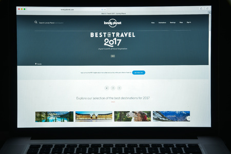 Milan, Italy - August 10, 2017: Loney Planet website homepage. It is the largest travel guide book publisher in the world. Loney planet logo visible.のeditorial素材