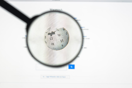 Milan, Italy - August 10, 2017: Wikipedia website homepage. It is a free online encyclopedia with the aim to allow anyone to edit articles. Wikipedia logo visible.のeditorial素材