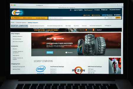 Milan, Italy - August 10, 2017: Newegg website homepage. It is an online retailer of items including computer hardware and consumer electronics. New egg logo visible.のeditorial素材