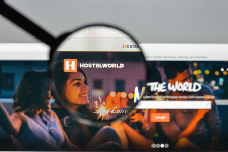 Milan, Italy - August 10, 2017: Hostelworld website homepage. Hostel world  logo visible.