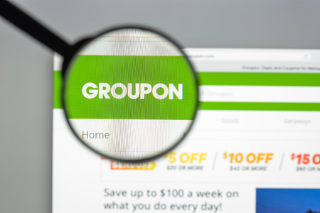 Milan, Italy - August 10, 2017: Groupon website homepage. It. is an American worldwide e-commerce marketplace connecting subscribers with local merchants by offering activities Groupon logo visible.のeditorial素材