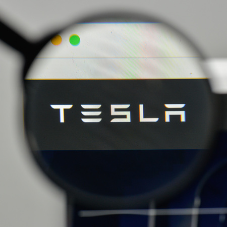 Milan, Italy - November 1, 2017: Tesla logo on the website homepage.のeditorial素材