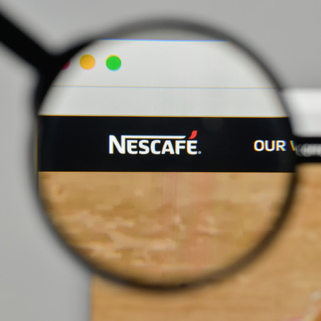 Milan, Italy - November 1, 2017: Nescafe logo on the website homepage.のeditorial素材