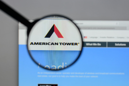 Milan, Italy - August 10, 2017: American Tower website homepage. It is a publicly held company, owner and operator of wireless and broadcast communications. American Tower logo visible.のeditorial素材