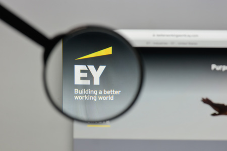 Milan, Italy - August 10, 2017: EY logo on the website homepage.のeditorial素材