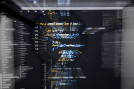 Real c  c code developing screen. Programing workflow abstract algorithm concept. Lines of c  c code visible under magnifying lens with moviment effect.の写真素材