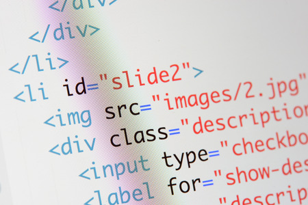 Real Html code developing screen. Programing workflow abstract algorithm concept. Lines of Html code visible.の写真素材