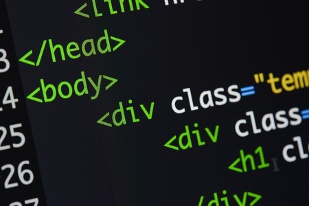 Real Html code developing screen. Programing workflow abstract algorithm concept. Lines of Html code visible.の写真素材