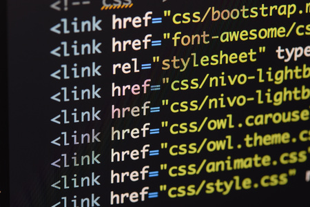 Real Html code developing screen. Programing workflow abstract algorithm concept. Lines of Html code visible.の写真素材