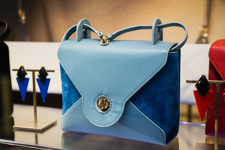 Milan, Italy - February 28, 2017: Shop window of a Armani shop in Milan - Montenapoleone area, Italy. Few days after Milan Fashion Week. Armani bags Spring Summer 2017 Collection.のeditorial素材