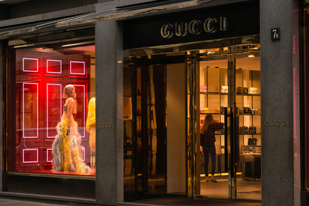 Milan, Italy - October 9, 2016: Shop window and entrance of a Gucci shop in Milan - Montenapoleone street, Italy. Few days after Milan Fashion Week. Fall Winter 2017 Collection.のeditorial素材
