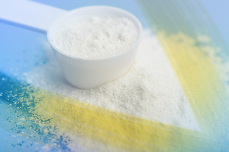 Power of Meds. Sport supplement, drug, creatine, hmb, bcaa, amino acid or vitamin mesure with powder. Sport nutrition concept.の写真素材