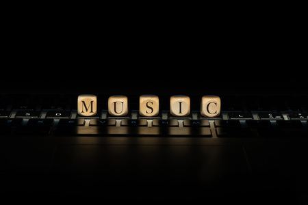 Music word on wooden cubes. Music conceptの写真素材