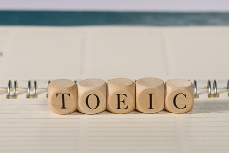 Toeic word on wooden cubes. Toeic conceptの写真素材