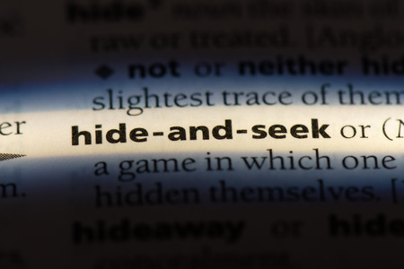 hide and seek word in a dictionary. hide and seek concept.の写真素材