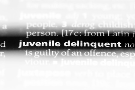 juvenile delinquent word in a dictionary. juvenile delinquent concept.の写真素材