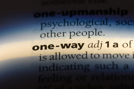 one way word in a dictionary. one way concept.の写真素材