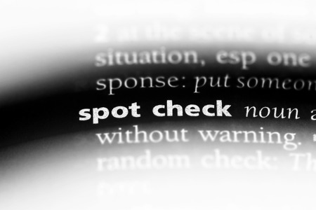 spot check word in a dictionary. spot check concept.の写真素材