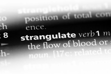 strangulate word in a dictionary. strangulate concept.の写真素材