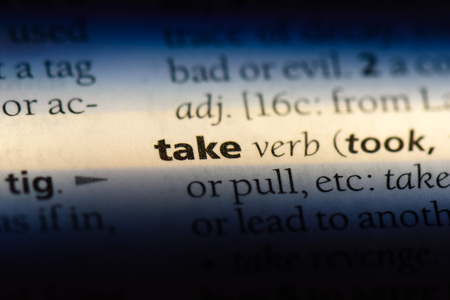 take word in a dictionary. take concept.の写真素材