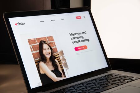 Milan, Italy - August 15, 2018: tinder website homepage. tinder logo visible.のeditorial素材
