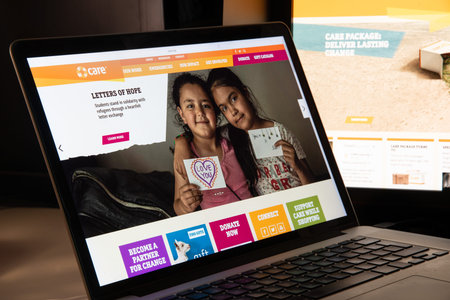 Milan, Italy - August 15, 2018: CARE NGO website homepage. CARE logo visible.