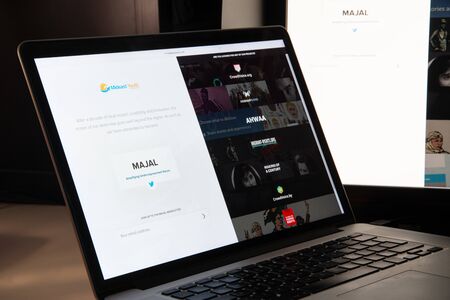 Milan, Italy - August 15, 2018: Mideast Youth Majal NGO website homepage. Mideast Youth Majal logo visible.のeditorial素材