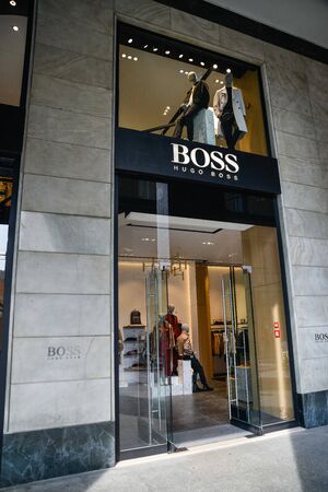Milan, Italy - September 21, 2018: Hugo Boss store in Milan. Montenapoleone area. Fashion week Hugo Boss shopping.のeditorial素材
