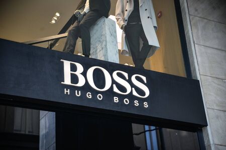 Milan, Italy - September 21, 2018: Hugo Boss store in Milan. Montenapoleone area. Fashion week Hugo Boss shopping.のeditorial素材