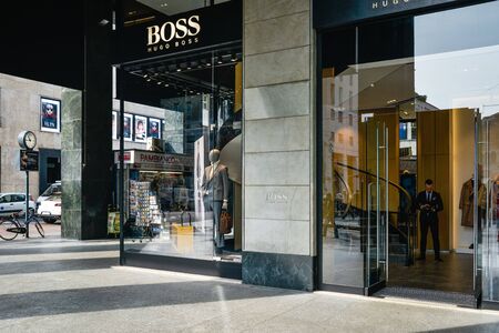 Milan, Italy - September 21, 2018: Hugo Boss store in Milan. Montenapoleone area. Fashion week Hugo Boss shopping.のeditorial素材