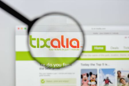 Milan, Italy - August 20, 2018: Tixalia Worldwide website homepage. Tixalia Worldwide logo visible.のeditorial素材