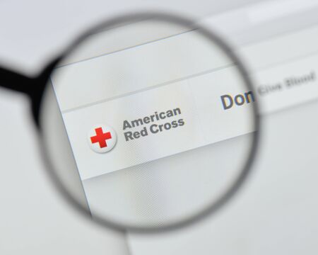 Milan, Italy - August 20, 2018: Red Cross website homepage. Red Cross logo visible.のeditorial素材