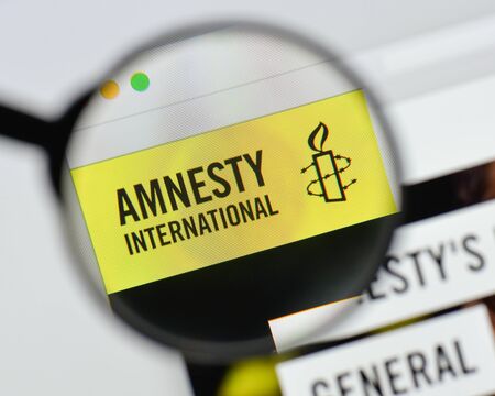 Milan, Italy - August 20, 2018: amnesty international website homepage. amnesty international logo visible.のeditorial素材