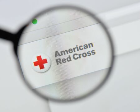 Milan, Italy - August 20, 2018: Red Cross website homepage. Red Cross logo visible.のeditorial素材