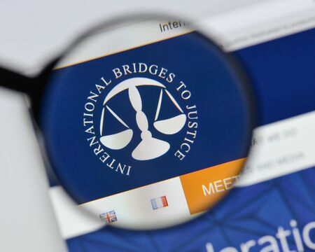 Milan, Italy - August 20, 2018: International Bridges to Justice website homepage. International Bridges to Justice logo visible.のeditorial素材