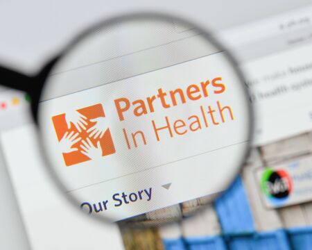 Milan, Italy - August 20, 2018: Partners in Health website homepage. Partners in Health logo visible.のeditorial素材