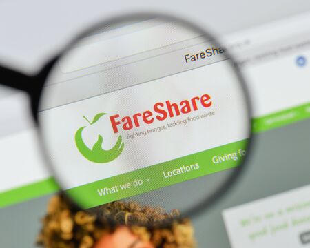 Milan, Italy - August 20, 2018: Fare Share website homepage. Fare Share logo visible.のeditorial素材