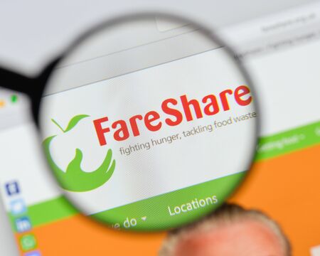 Milan, Italy - August 20, 2018: Fare Share website homepage. Fare Share logo visible.のeditorial素材