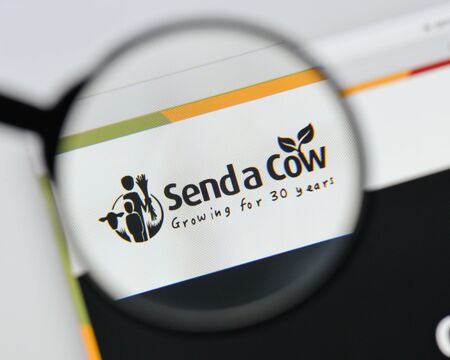Milan, Italy - August 20, 2018: Send a Cow Uganda website homepage. Send a Cow Uganda logo visible.のeditorial素材
