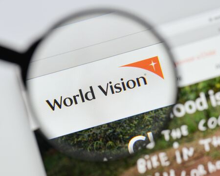 Milan, Italy - August 20, 2018: World Vision website homepage. World Vision logo visible.のeditorial素材