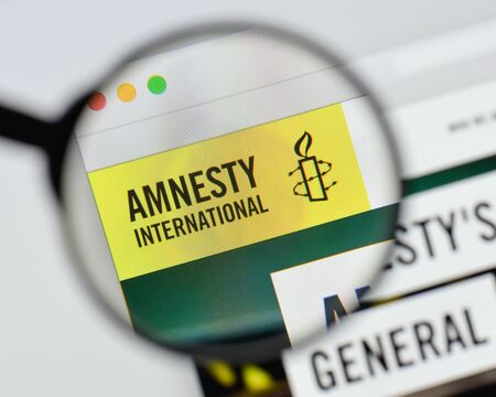 Milan, Italy - August 20, 2018: amnesty international website homepage. amnesty international logo visible.のeditorial素材