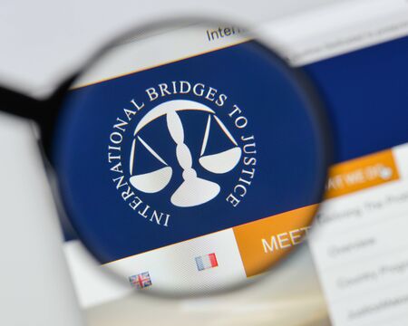 Milan, Italy - August 20, 2018: International Bridges to Justice website homepage. International Bridges to Justice logo visible.のeditorial素材